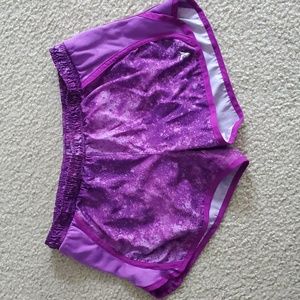 Old navy active shorts, women's size medium, purple color. Like new